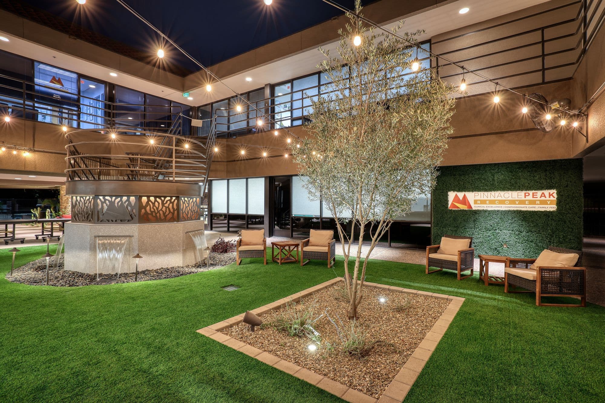 Courtyard at the Scottsdale residential campus, with seating around a stone water feature